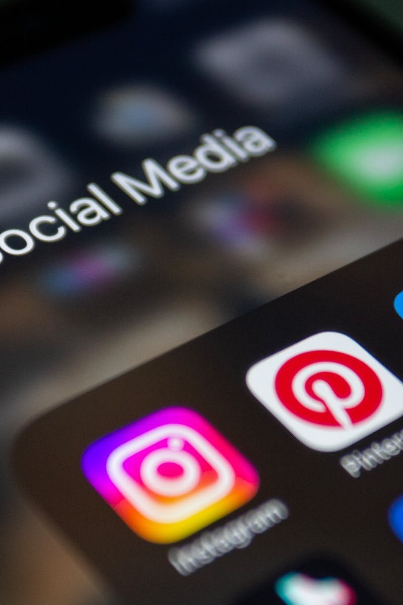 A smartphone screen displaying popular social media applications like Instagram and Twitter.